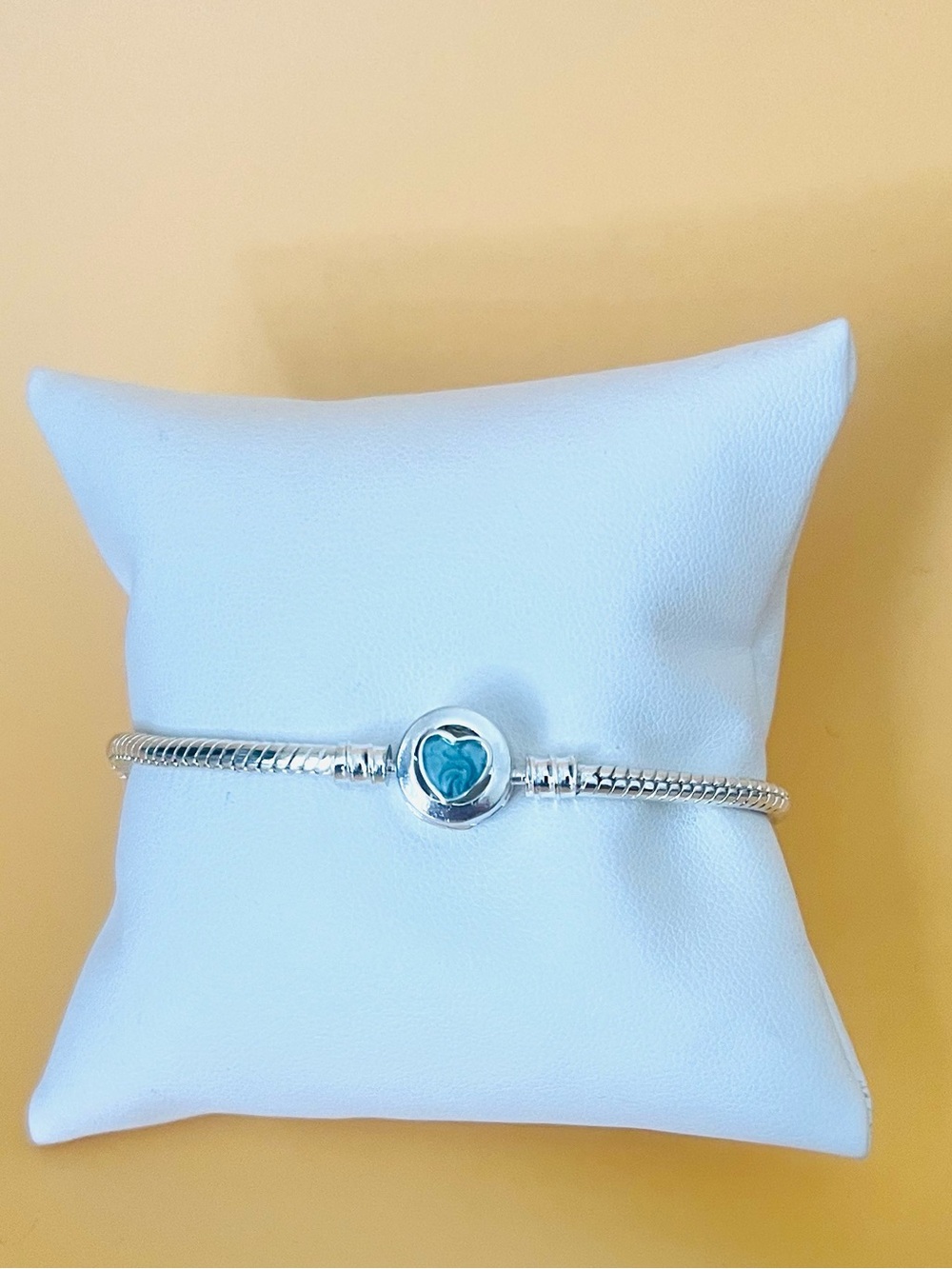 Silver plated bangle bracelet with enamel heart clasp